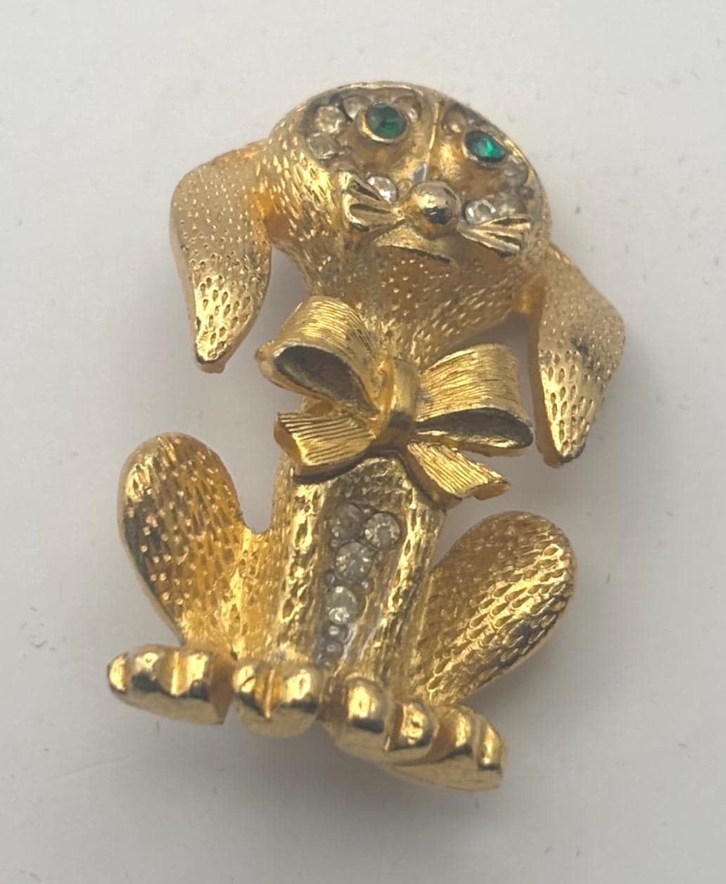 Gold Puppy with Green Rhinestone Eyes Pin, Dog with Bow Brooch, Signed SAO