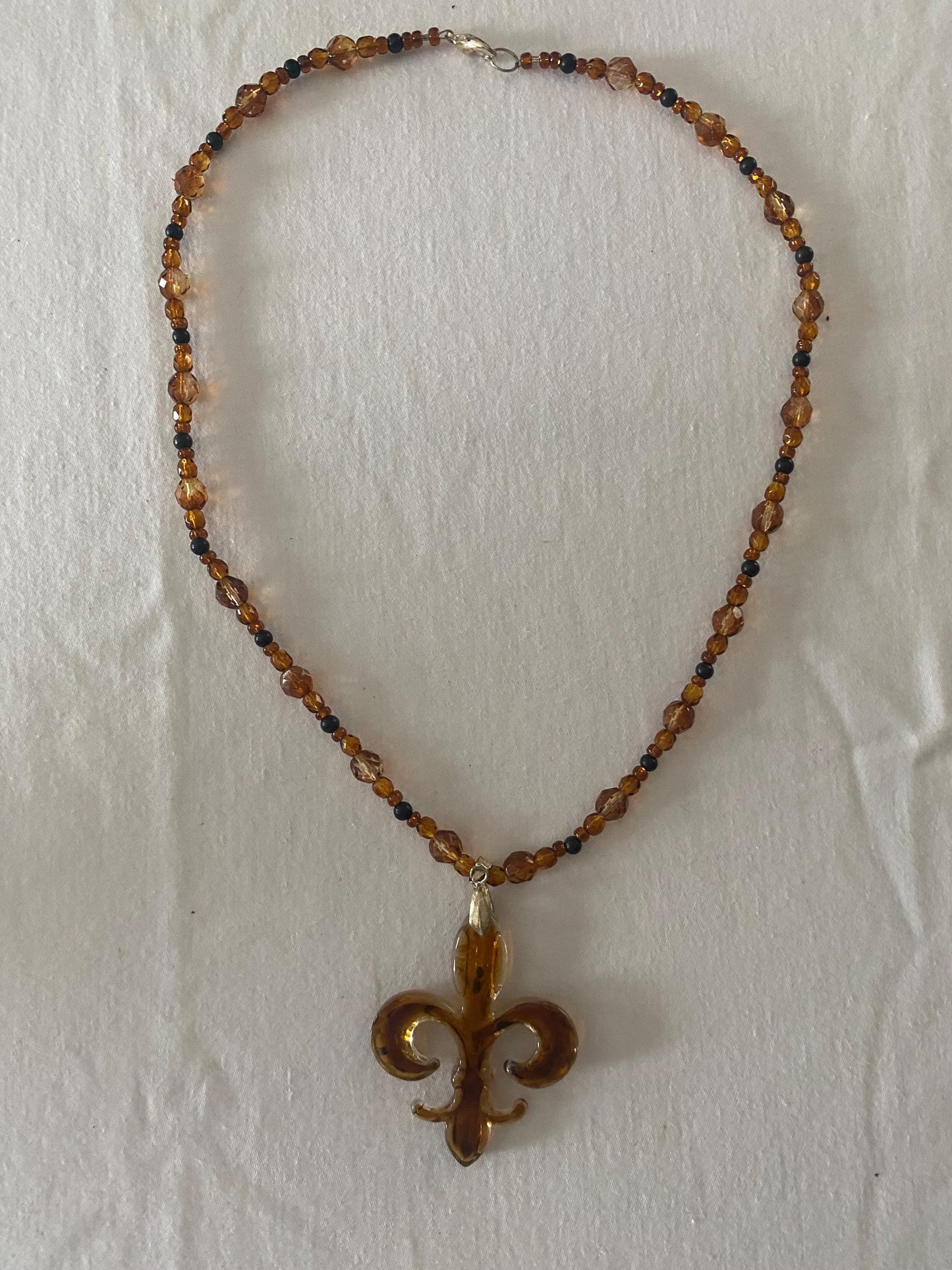 Vintage Amber Beaded Necklace: Fleur de Lis Pendant