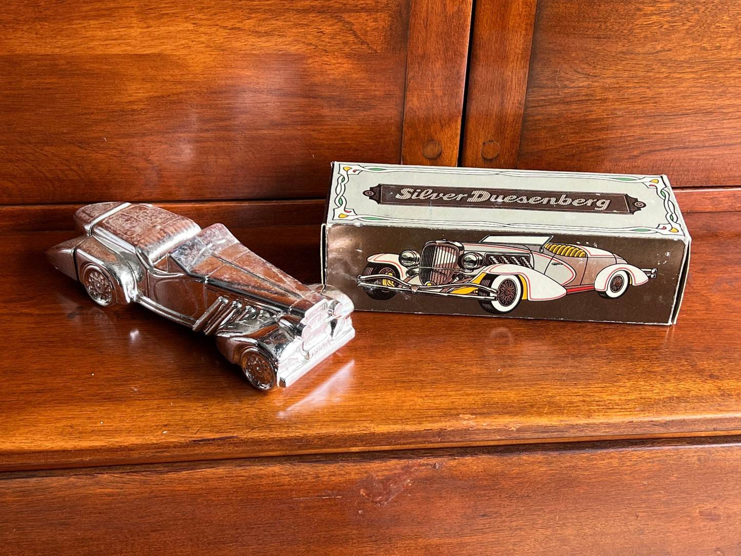 Vintage Avon Silver Duesenberg Car Decanter: Wild Country After Shave, Full Bottle