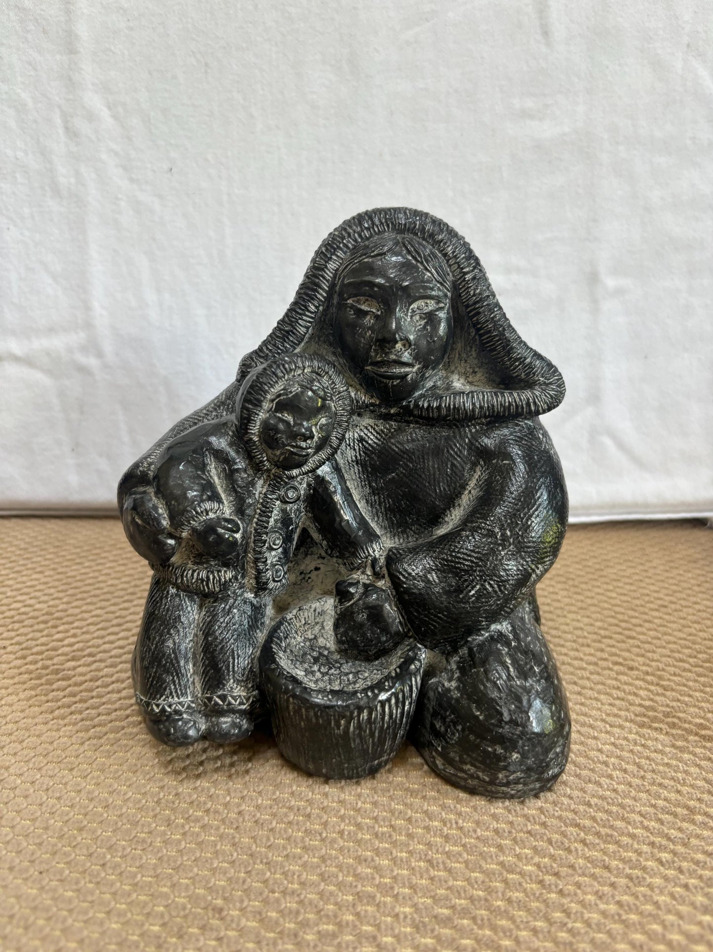Vintage Inuit Mother & Child Cast Iron Figurine: The Wolf Sculptures