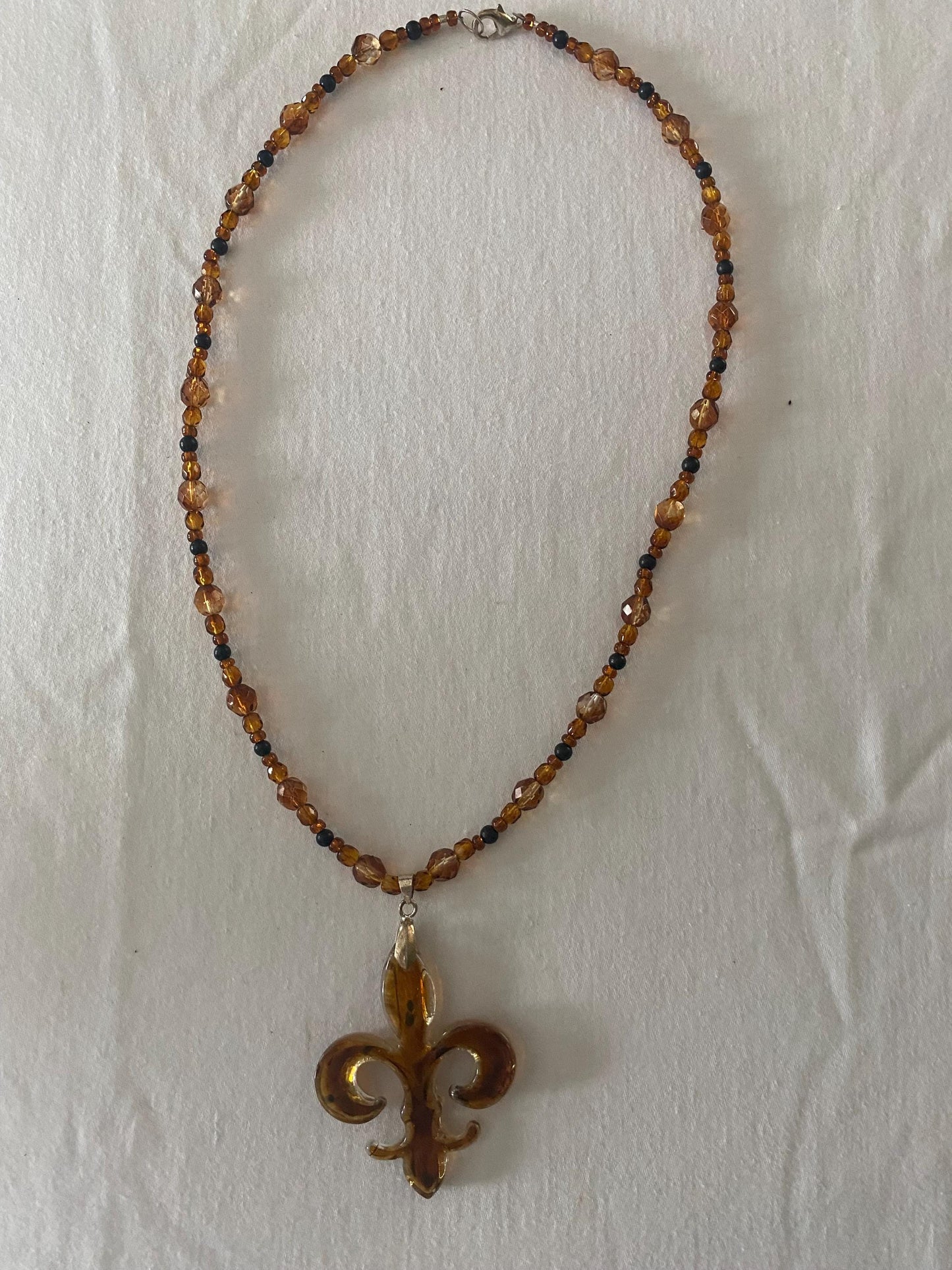 Vintage Amber Beaded Necklace: Fleur de Lis Pendant
