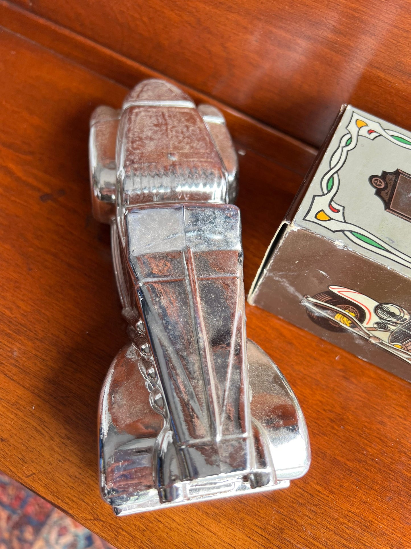 Vintage Avon Silver Duesenberg Car Decanter: Wild Country After Shave, Full Bottle
