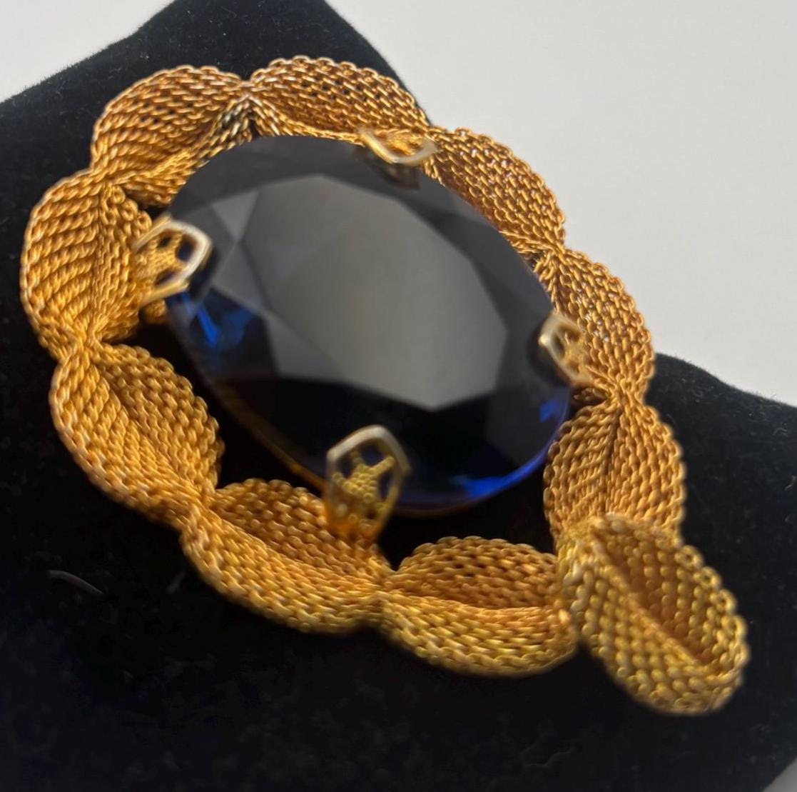 Gold Tone Mesh Brooch with Large Blue Crystal Stone
